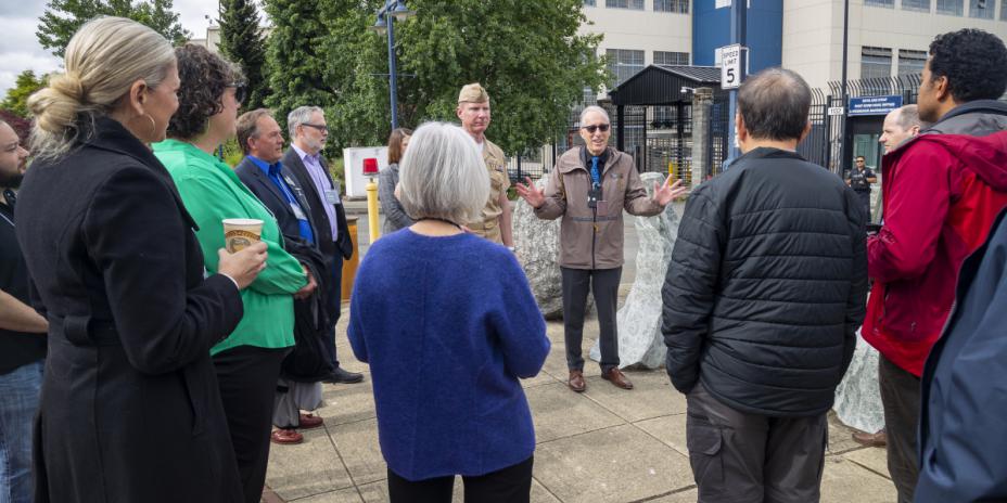 Group of people listening to tour guide