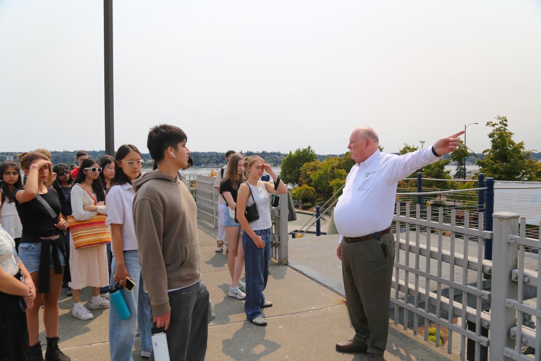 Kitsap Transit Executive Director leading students on tour around the Kitsap transit center.